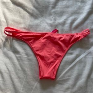 Neon pink Victoria’s Secret bathing suit bottom